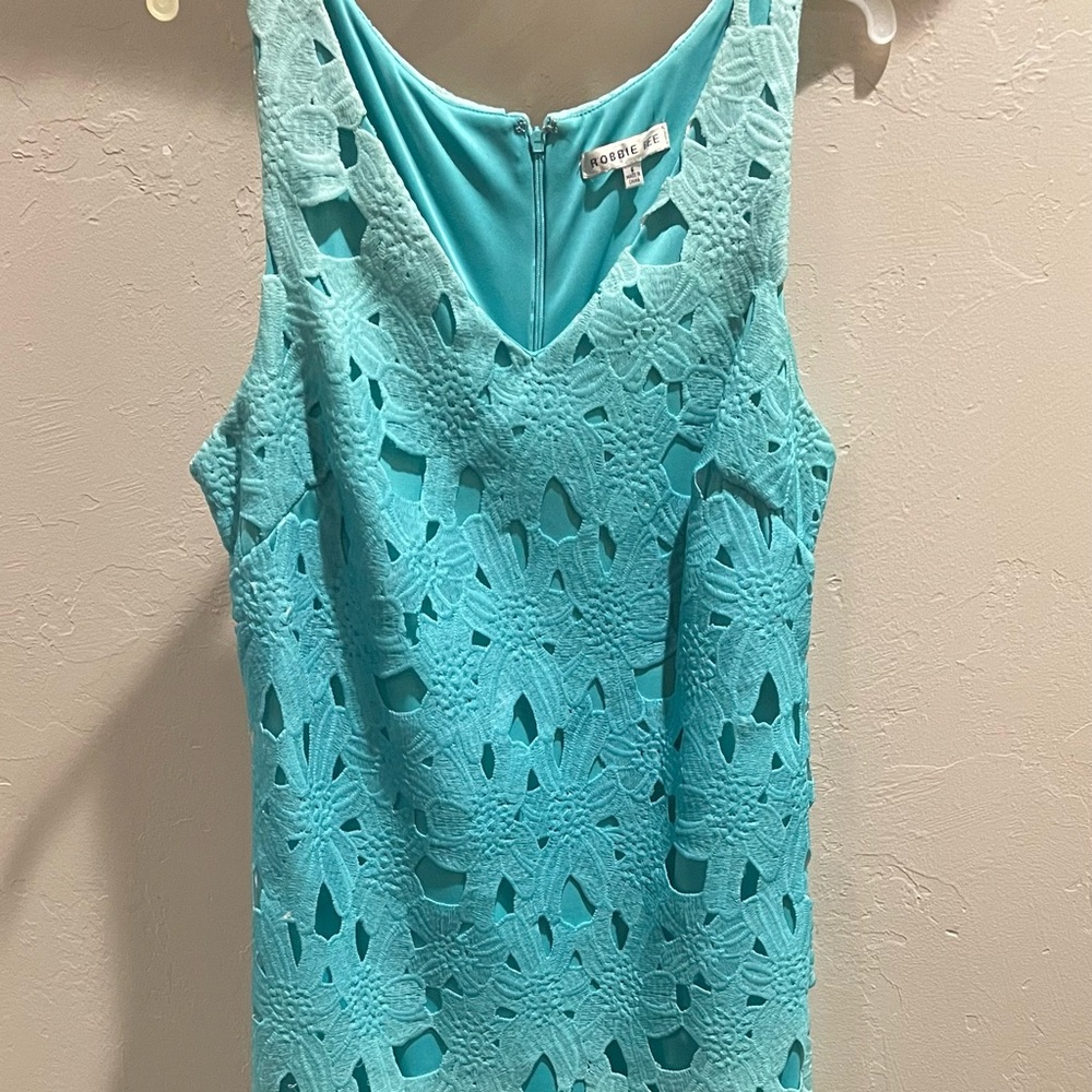 Business casual dress in a beautiful turquoise color.